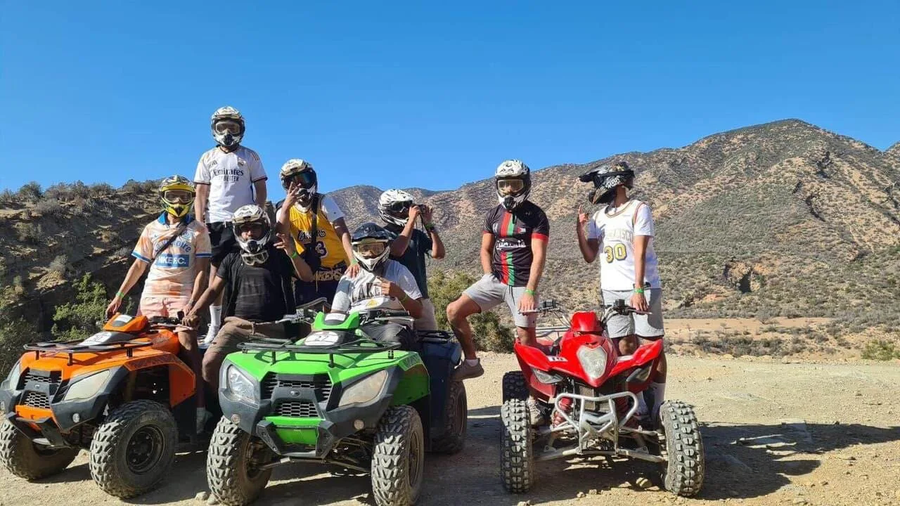 Young guest enjoying an Agadir quad bike experience at sunset