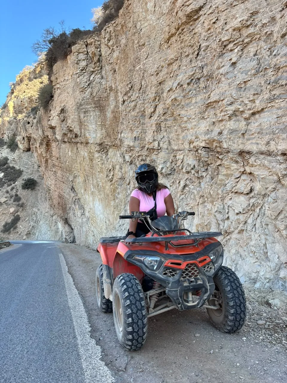 Traveler posing on a quad bike near Agadir beach