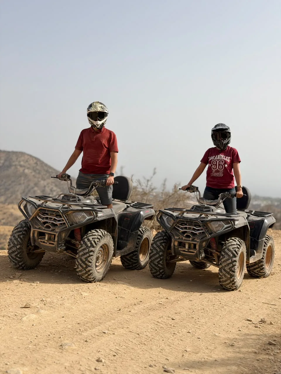 Quad bike rider on a dusty mountain track near Agadir